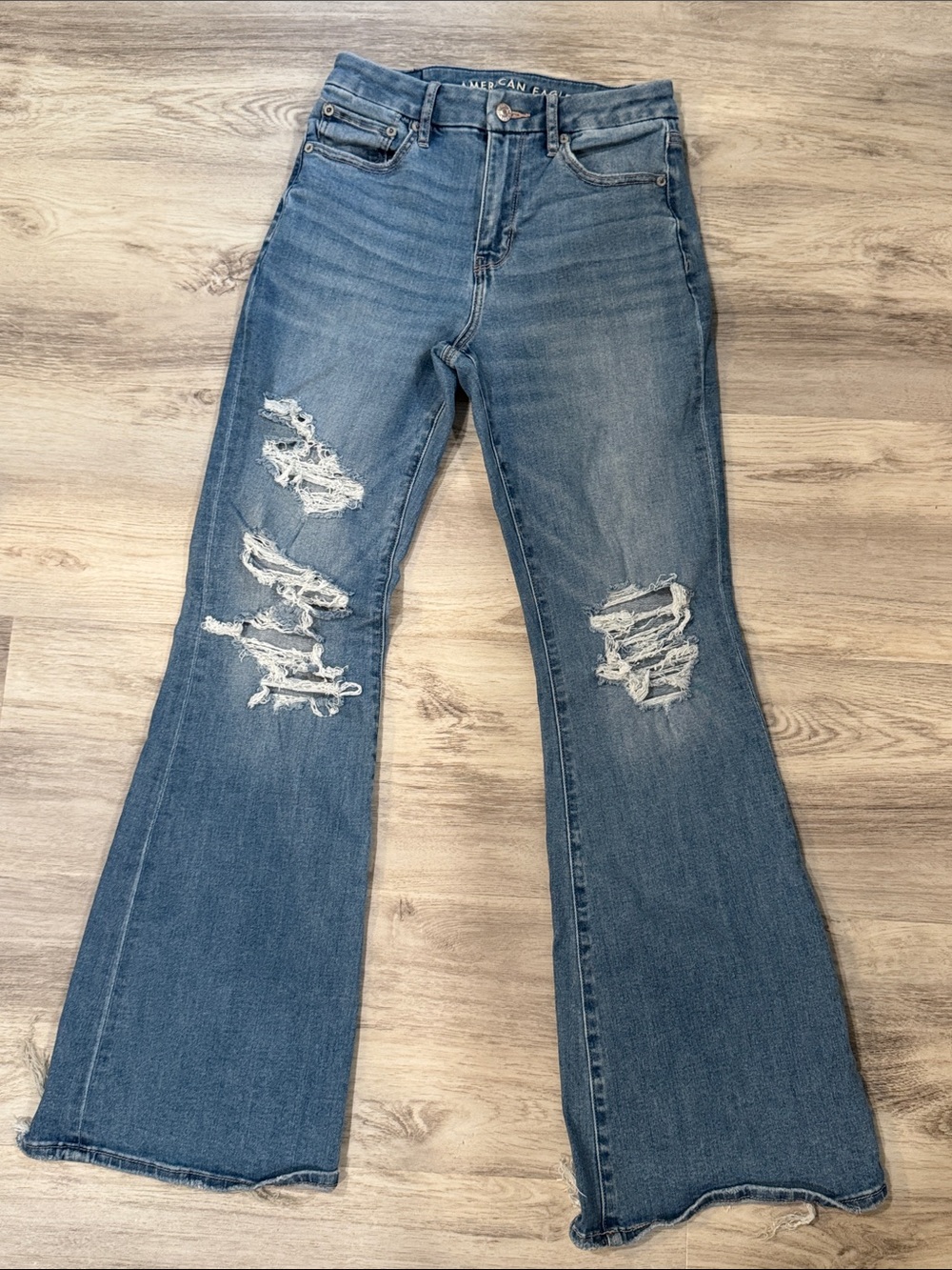 American Eagle Outfitters Blue Distressed Flare curvy super high rise flare sz 2